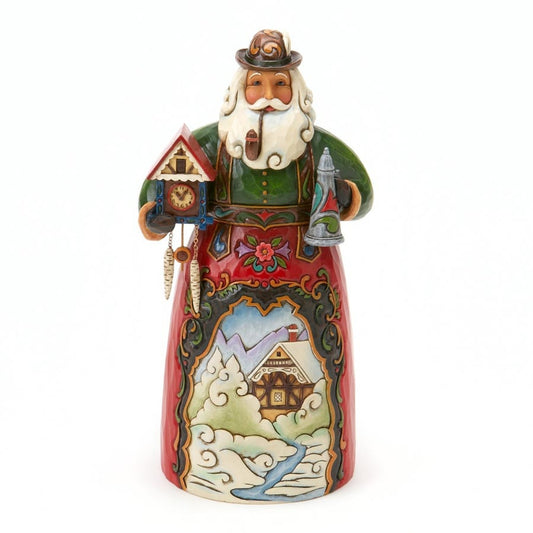 Hand-painted Christmas figurine of a jovial, bearded man in traditional German clothing, holding a cuckoo clock and a glass of wine, set against a plain white background.