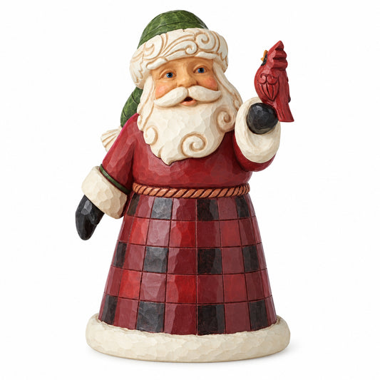 Decorative figurine of a Santa Claus holding a fish on a white background