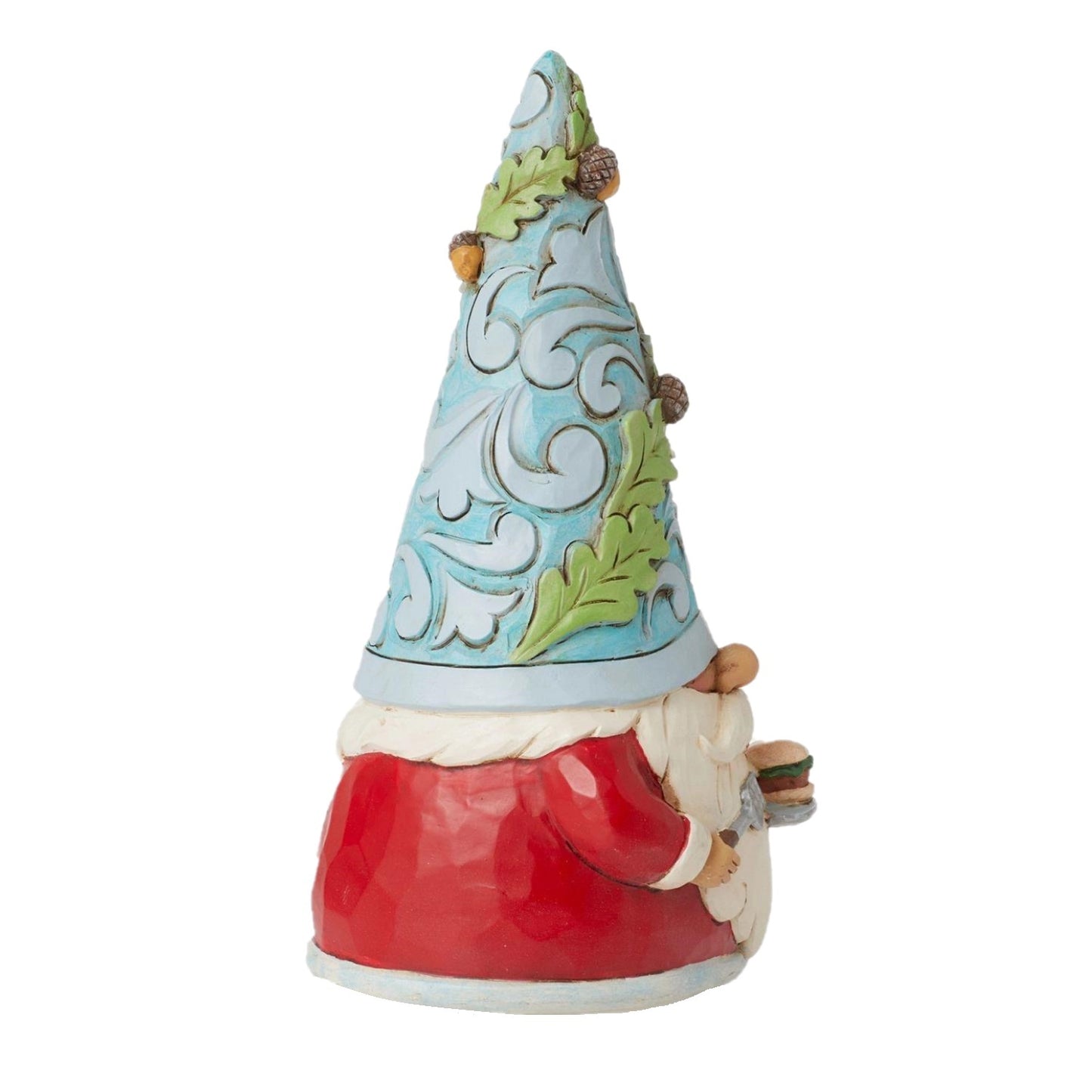 A decorative gnome figurine with a tall pointed hat decorated in light blue, white scrollwork, and green leaves, wearing a red coat and white beard, shown on a plain white background.