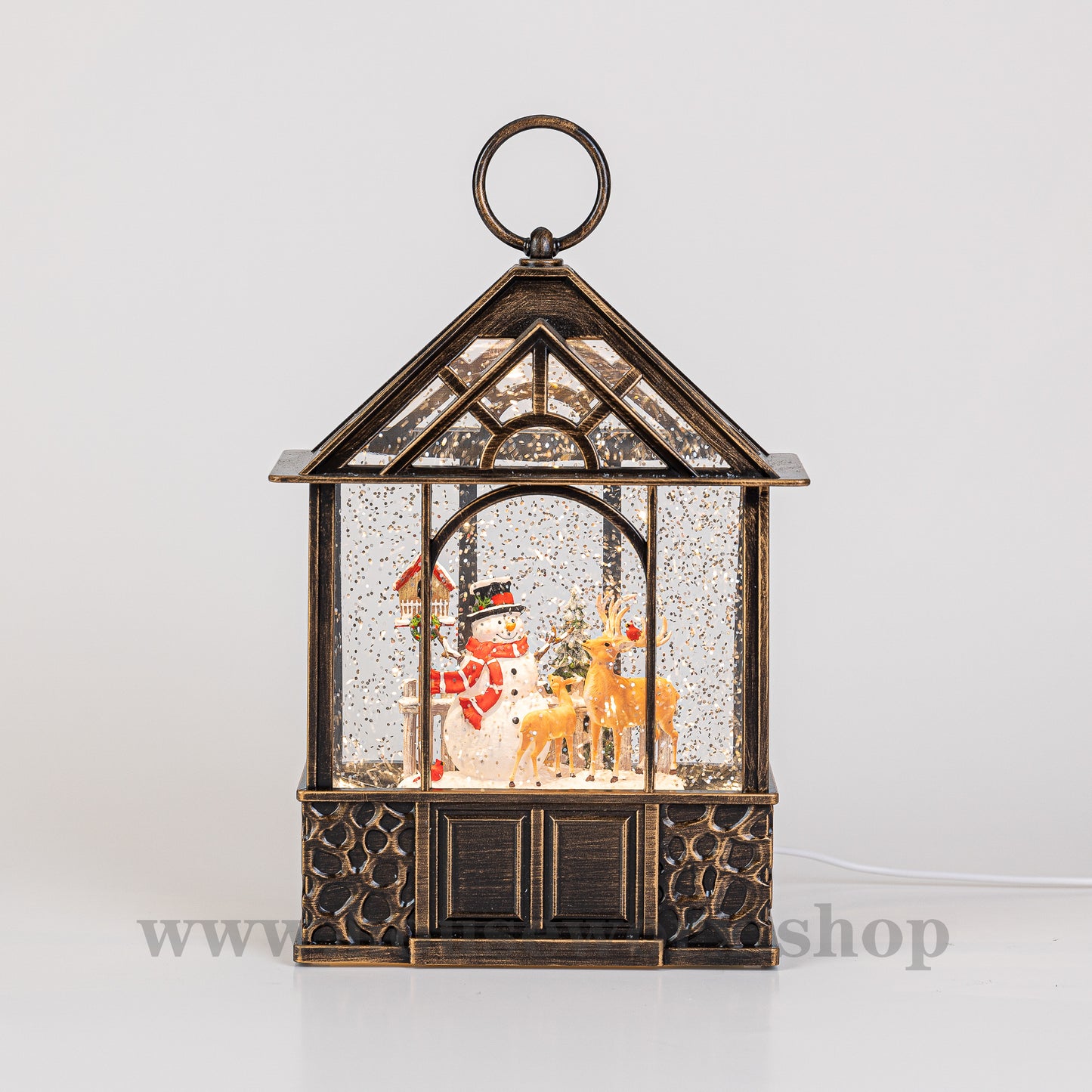 stable christmas snow globe santa front