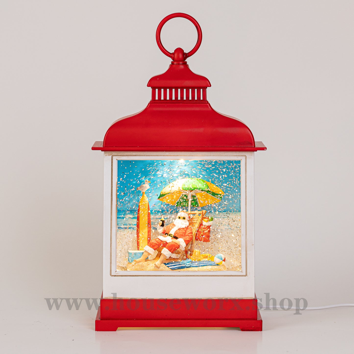Aussie beach santa christmas snow globe front