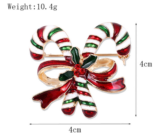 A brooch designed to resemble a candy cane, with a red and white striped bow on a green and red striped brooch, against a white background. The brooch is labeled with 'Weight: 10.