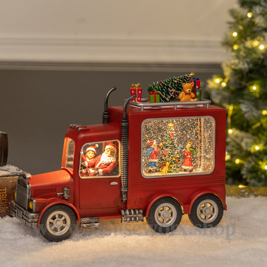 Festive truck santa snow globe