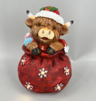 Highland Cow in Santa Sack Figurine
