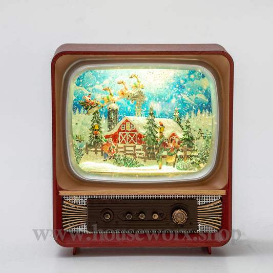 Vintage-style television with a Christmas scene on its screen against a white background christmas snow lobe