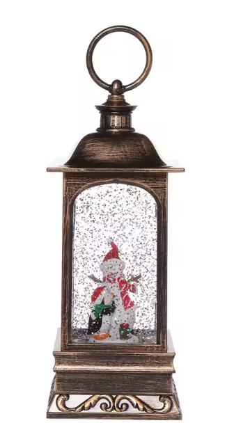Decorative lantern with a snowman inside on a white background