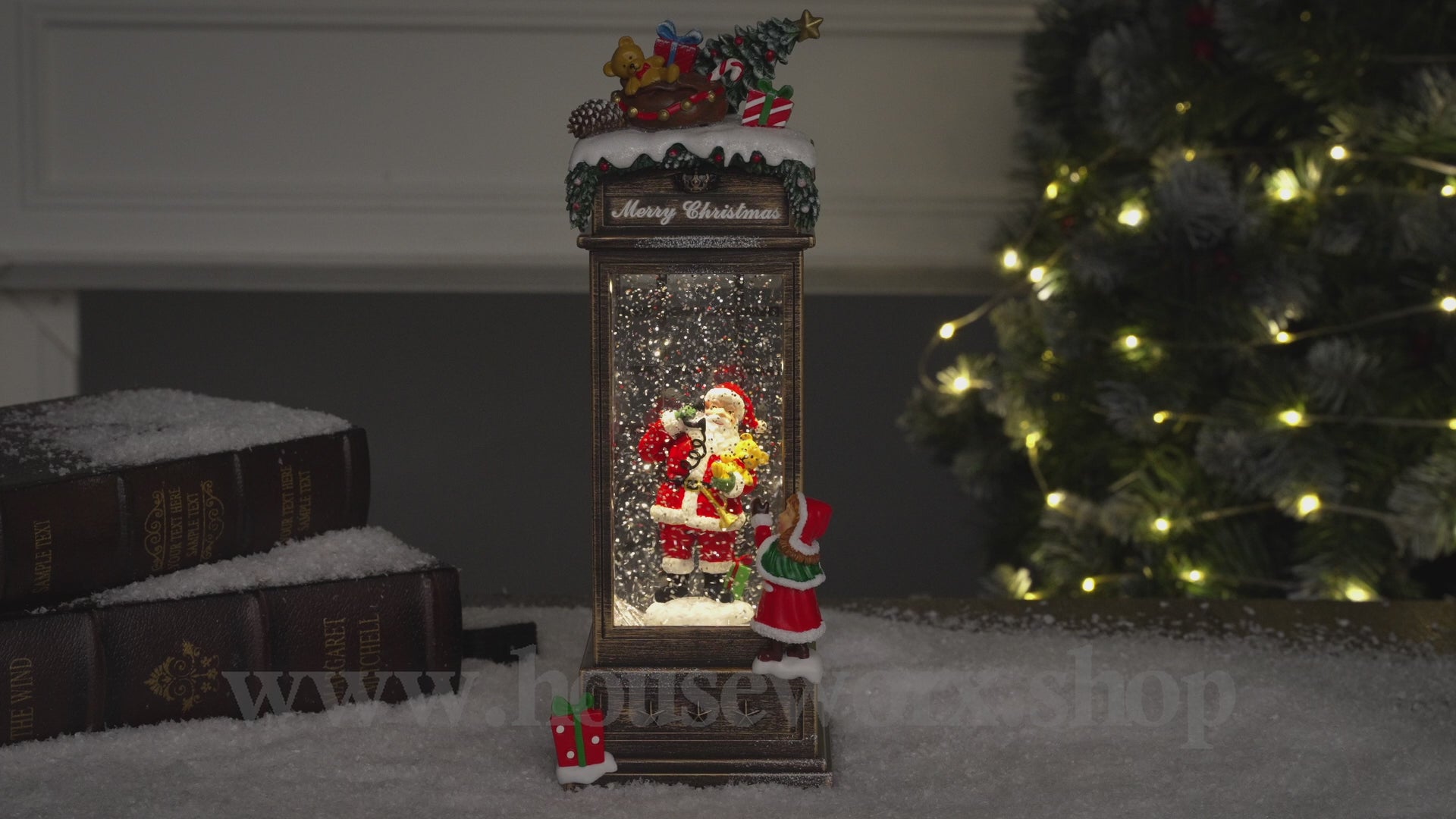 Festive telephone booth santa snow globe video