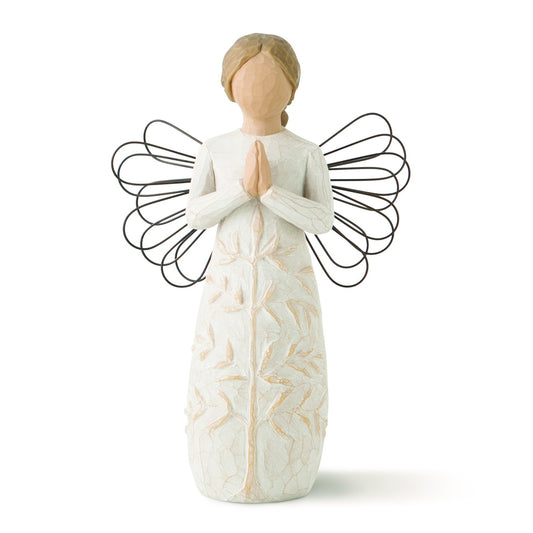 White angel figurine with wire wings on a white background
