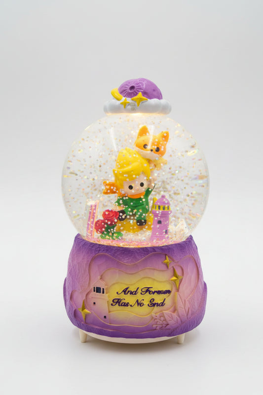 A purple and gold fairy-themed snow globe music box with a glowing interior, featuring a character in a green dress, a fox, and the phrase 'And Forever Has No End' on the base, shown on a kitchen countertop.