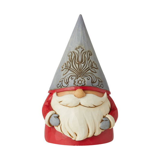 A decorative garden gnome figurine with a pointed silver hat featuring a gold ornamental pattern, a red coat, and a long cream beard, shown against a plain white background.