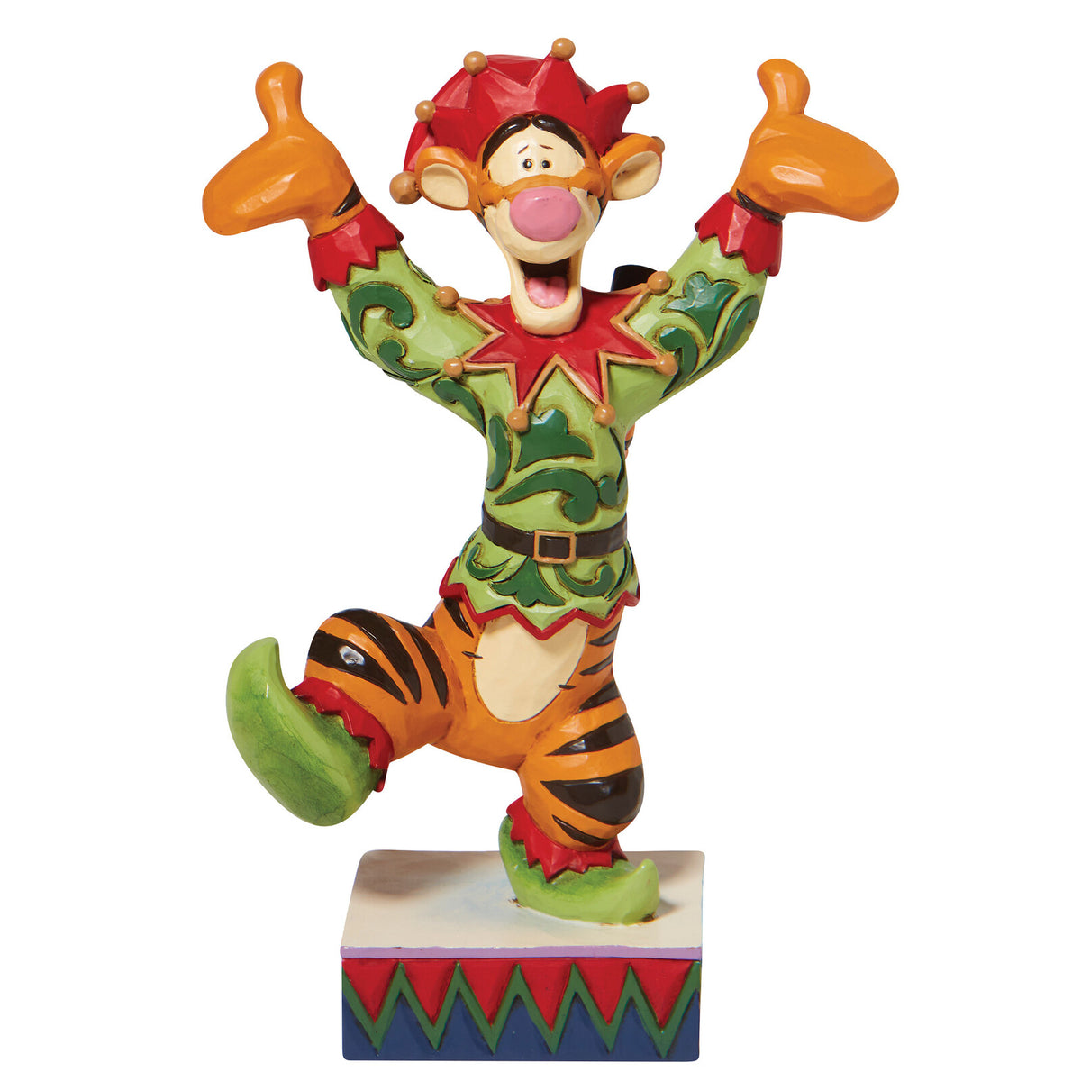 Colorful figurine of a cartoon tiger with a crown on a white background