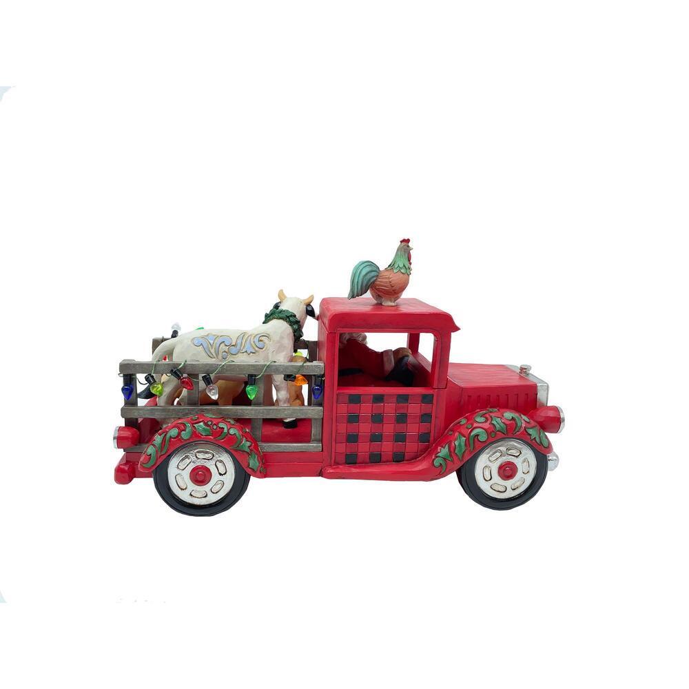 A decorative red pickup truck figurine carrying a white horse and a rooster, shown against a plain white background.