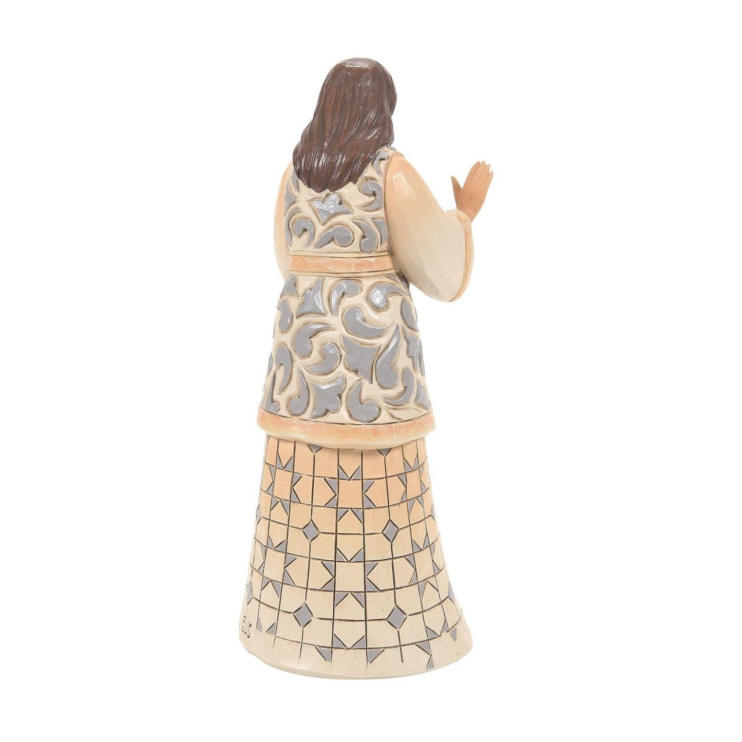 A decorative figurine of a woman with long brown hair, shown from the back, wearing a patterned dress with beige, gray, and brown tones on a plain white background.