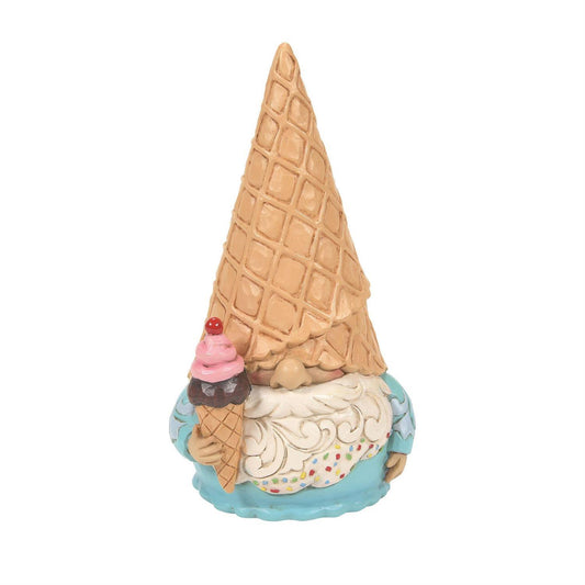 Gnome figurine with an ice cream cone hat on a white background