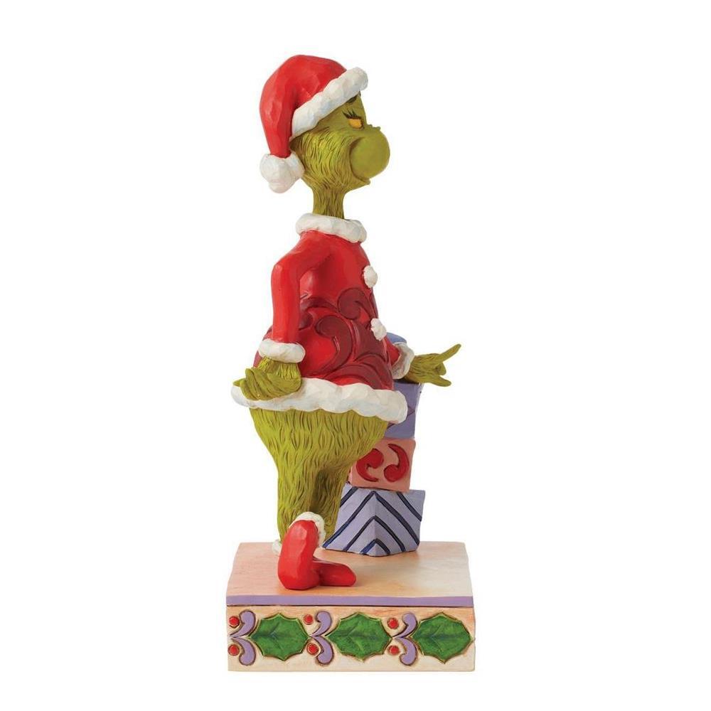 How the Grinch Stole Christmas

This Jim Shore creation features The Grinch dressed as Santa leaning against a stack of prettily wrapped presents. With his legs crossed, Grinch stands with an attitude and one hand on his hip. Will he steal Christmas or learn to love the season?
