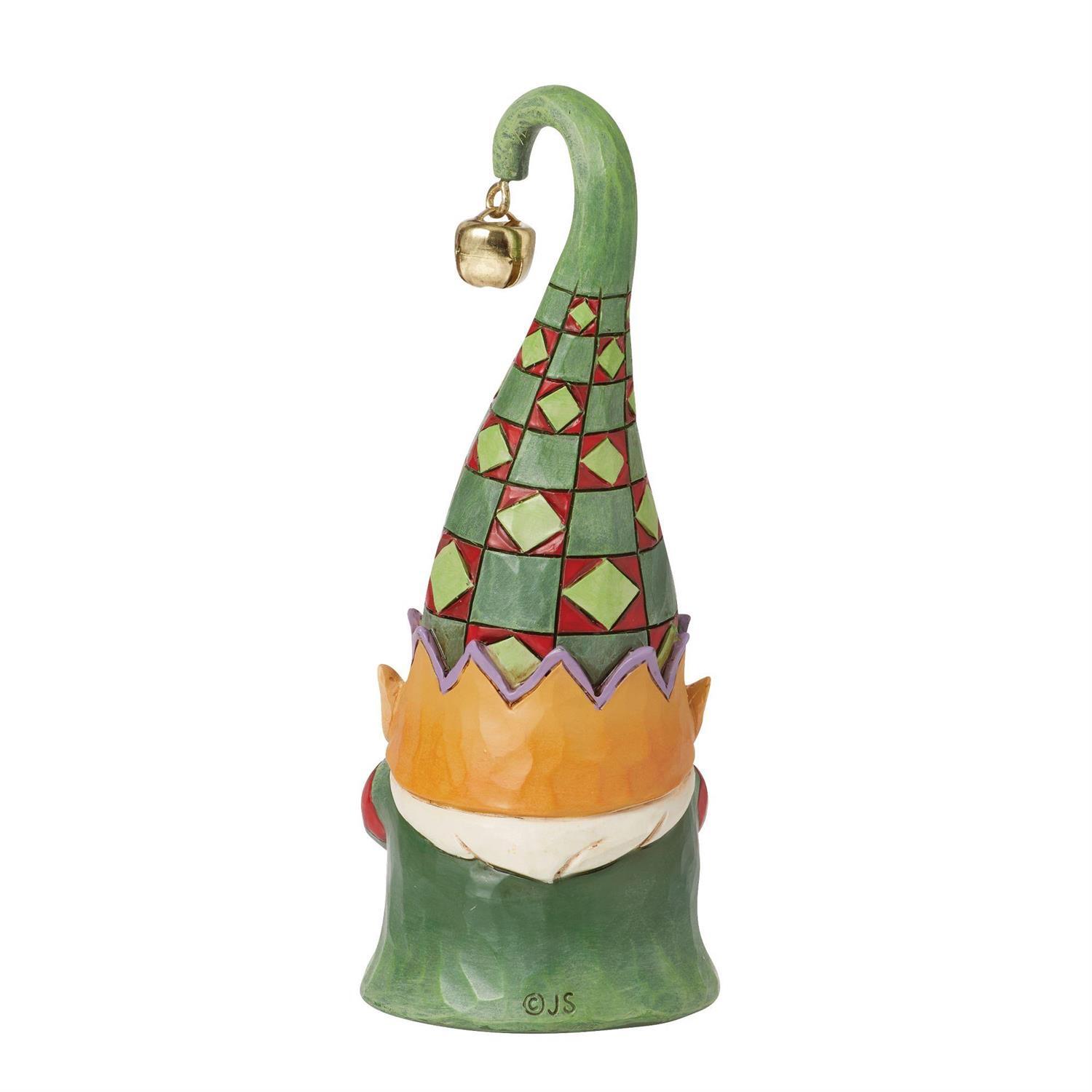 Colorful gnome figurine with a patterned hat on a white background