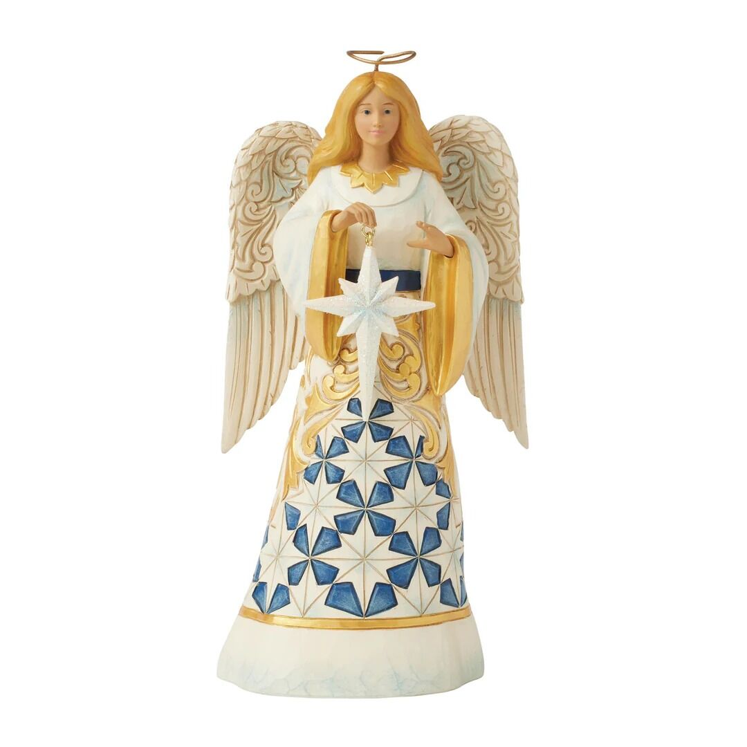 An angel figurine with long blonde hair, a gold halo, and large cream-colored wings. She wears a white robe with gold trim and a blue-and-white geometric star pattern on the skirt, holding a white star ornament.