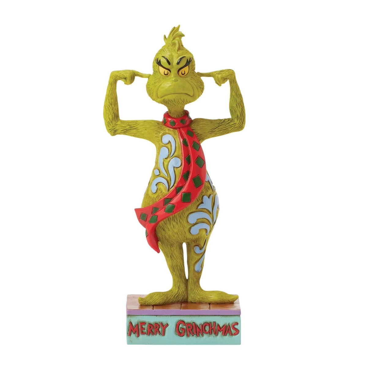 A Dr. Seuss Grinch figurine posing with his arms flexed, wearing a red and green polka-dot scarf and blue swirl patterns on his yellow-green skin, standing on a base that reads 'MERRY GRINCHAS'.