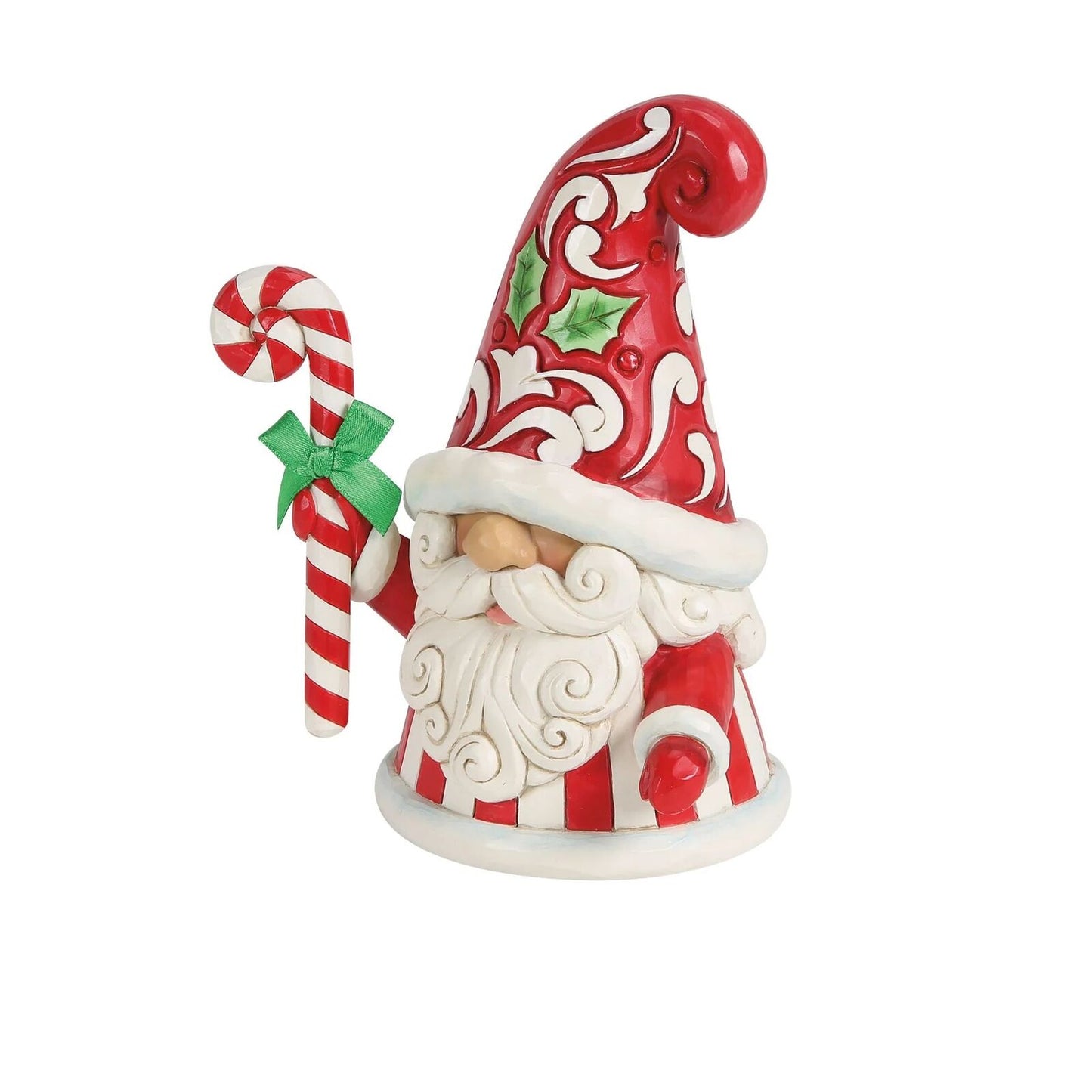 Decorative gnome figurine with a red hat and candy cane on a white background