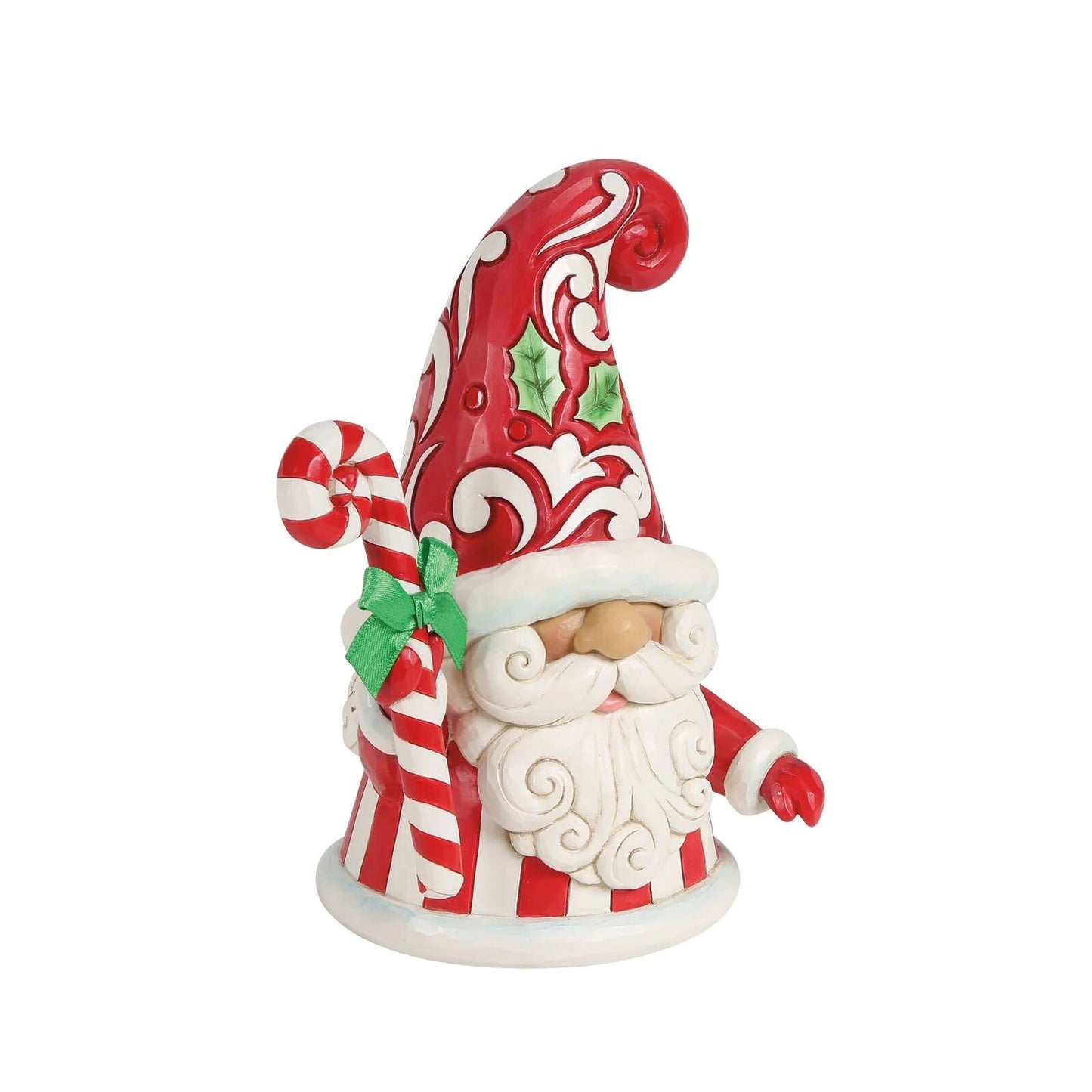 Decorative gnome figurine with a red and white hat and candy cane, on a white background