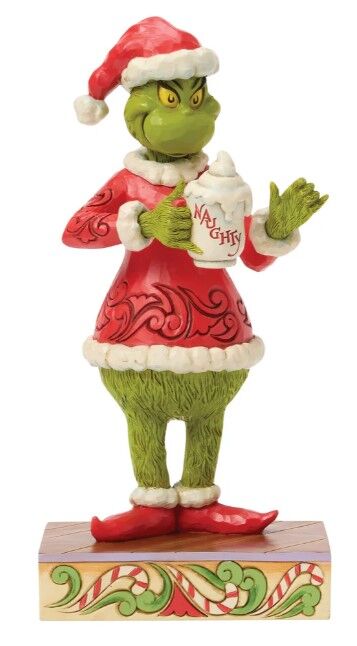 Animated character figurine holding a mug with text on a white background