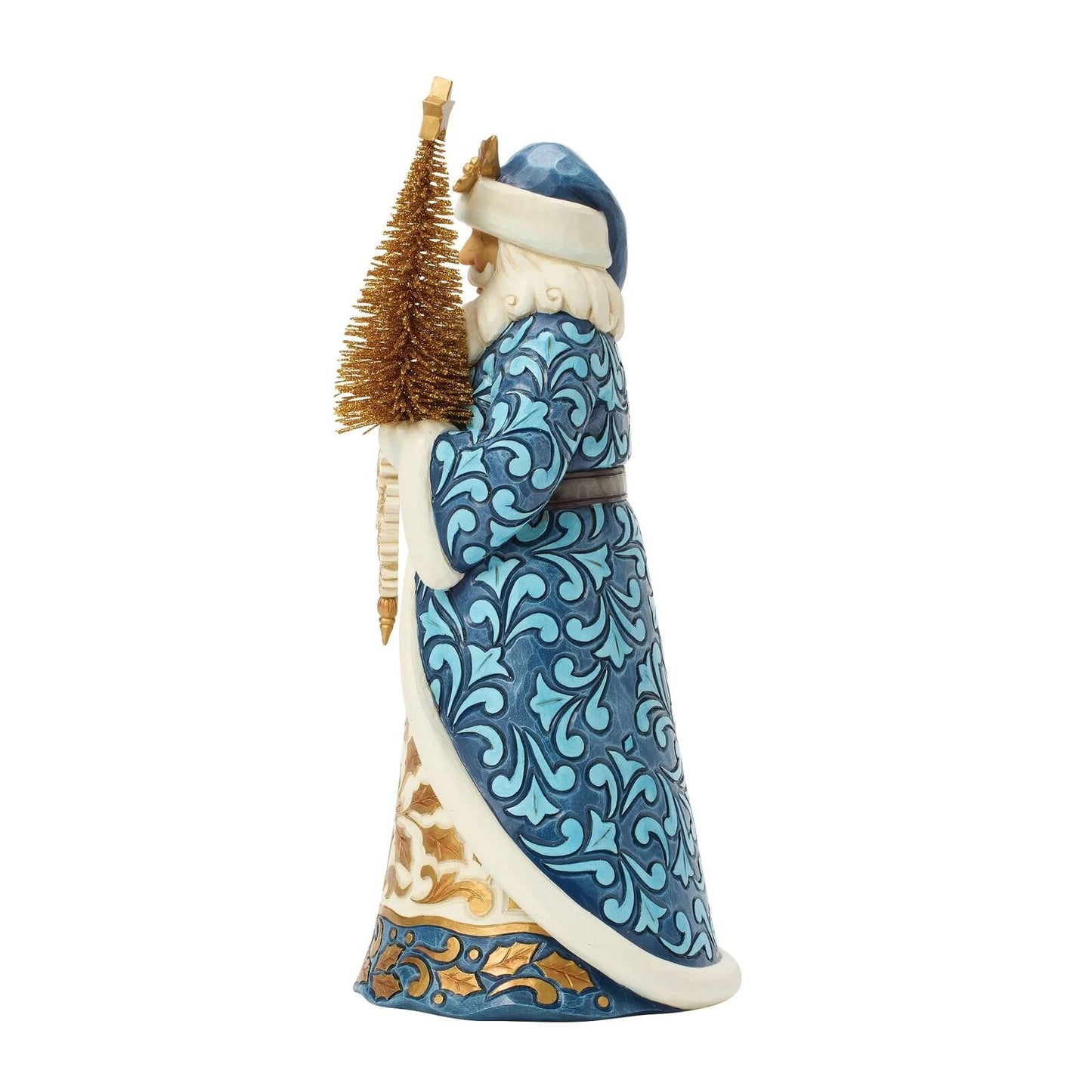 Decorative figurine of a person in a blue patterned outfit holding a small tree on a white background