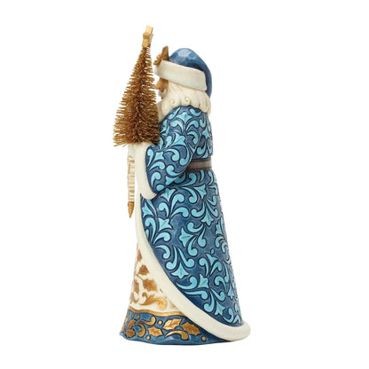 Decorative figurine of a person in a blue patterned outfit holding a small tree on a white background