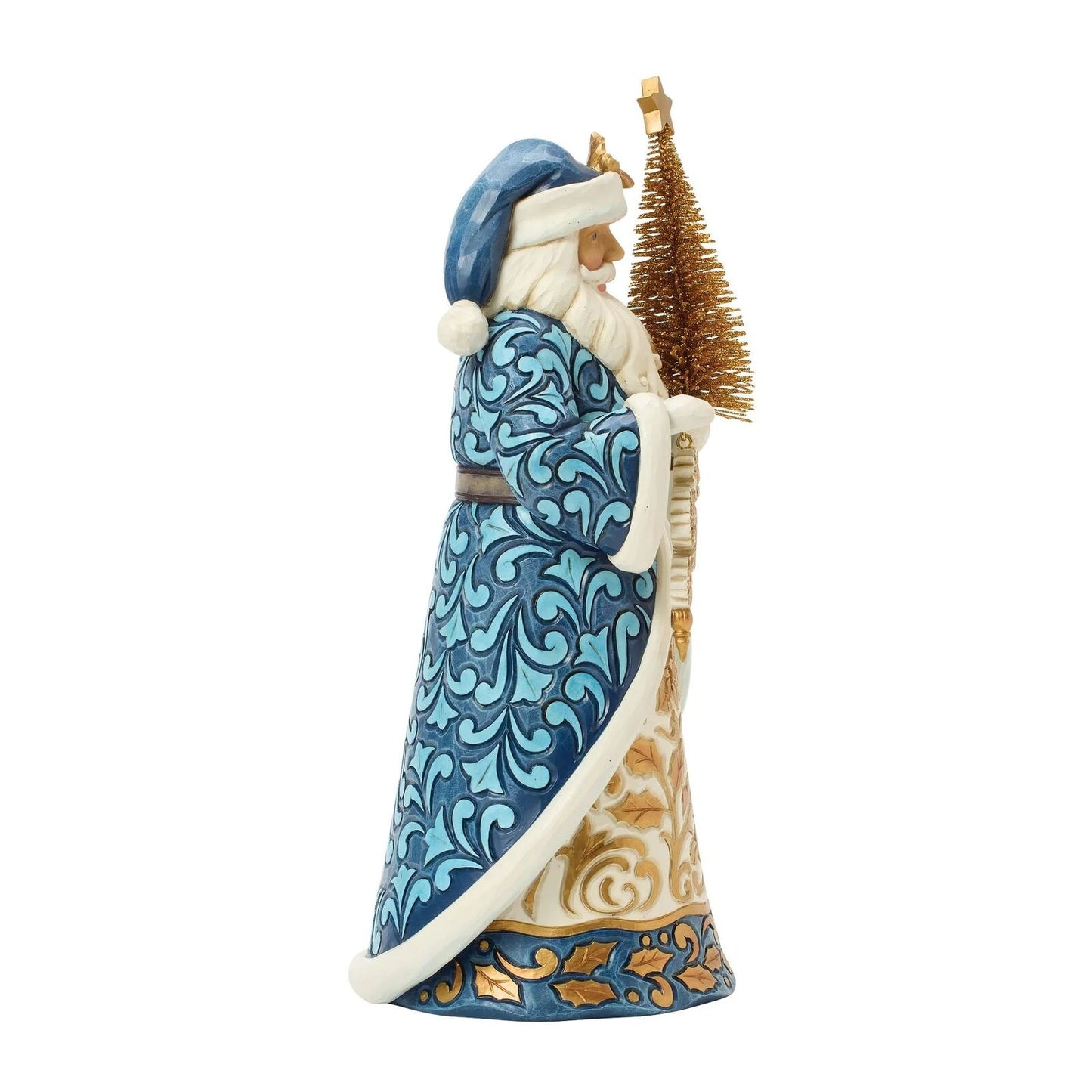 Decorative figurine of a Santa Claus holding a tree on a white background