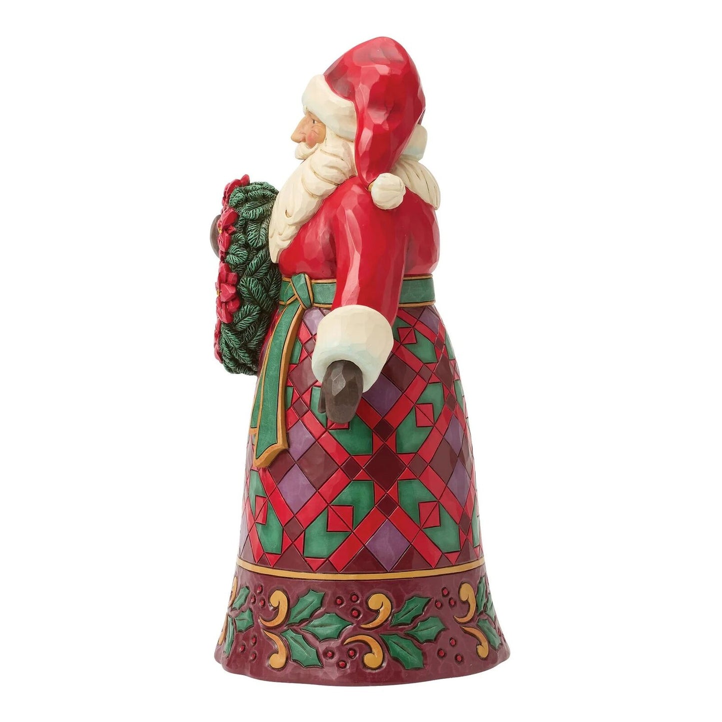 Decorative figurine of a Santa Claus with a wreath on a white background