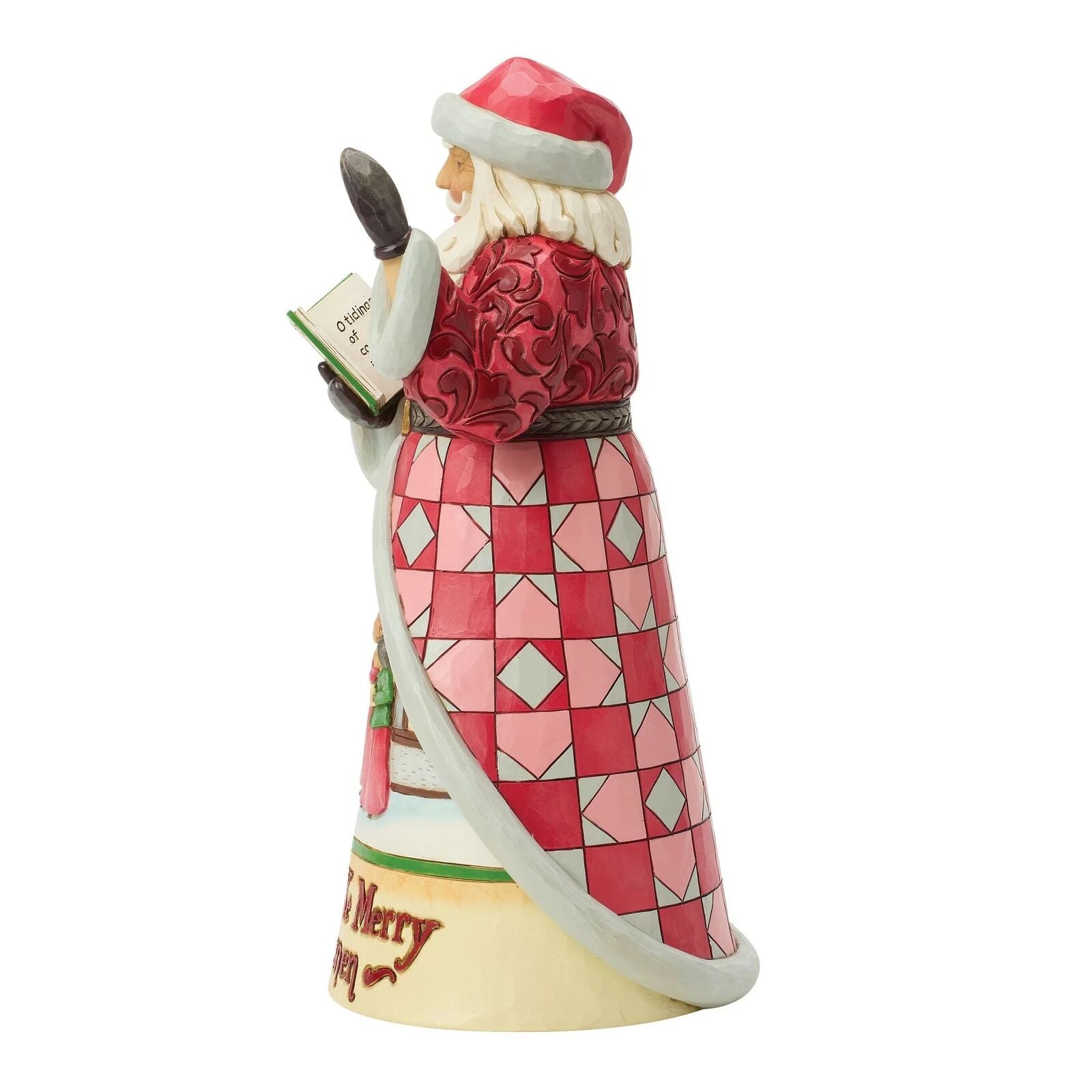 Decorative figurine of a Santa Claus character with a red geometric-patterned dress on a white background.
