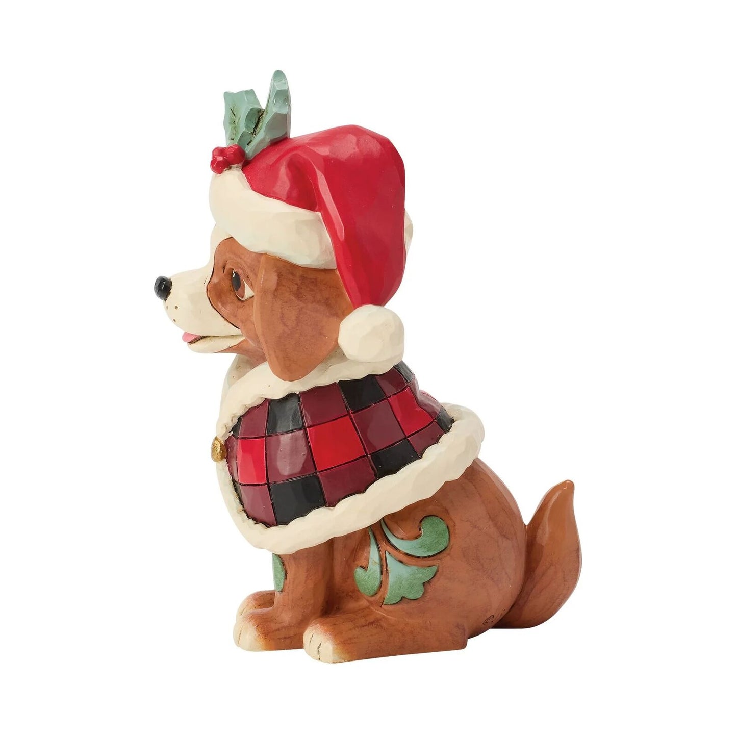 Dog figurine wearing a Santa hat and plaid coat on a white background