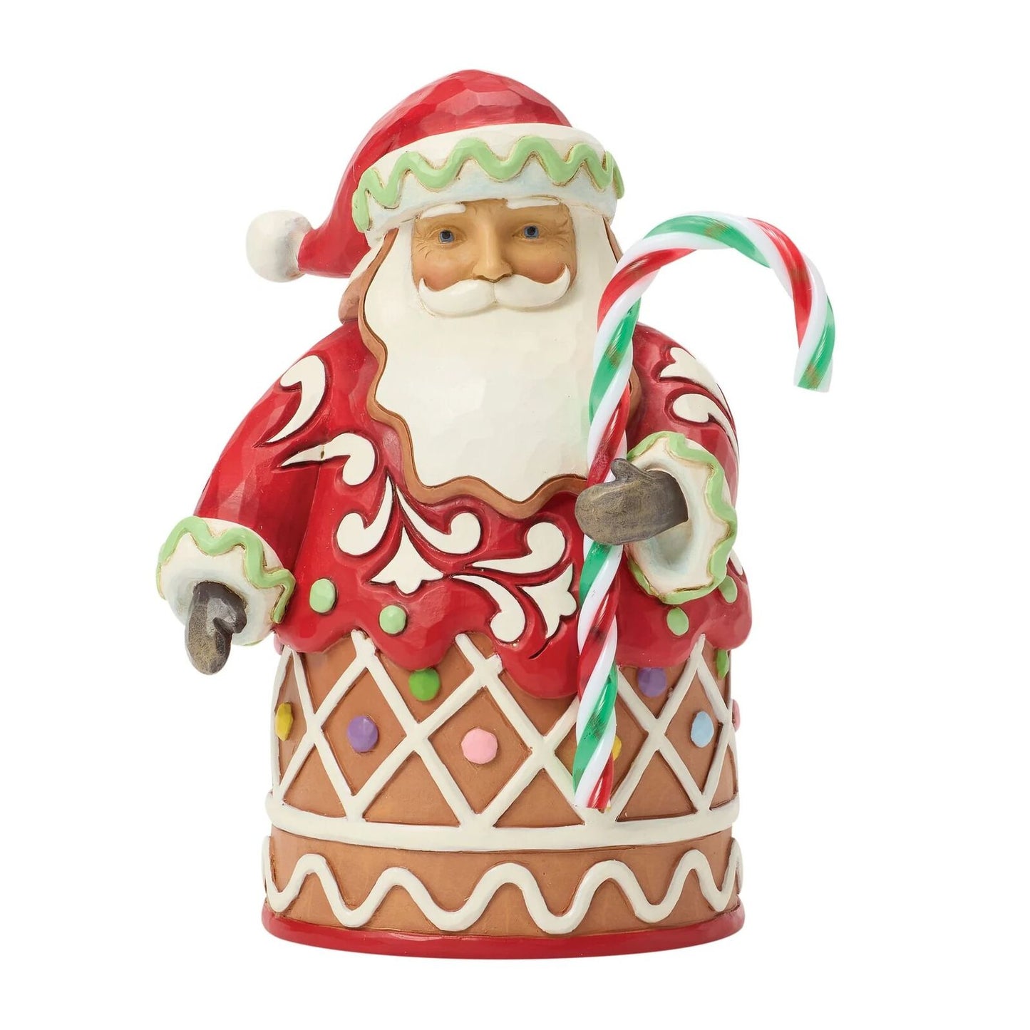 Decorative gingerbread man with candy cane on a white background