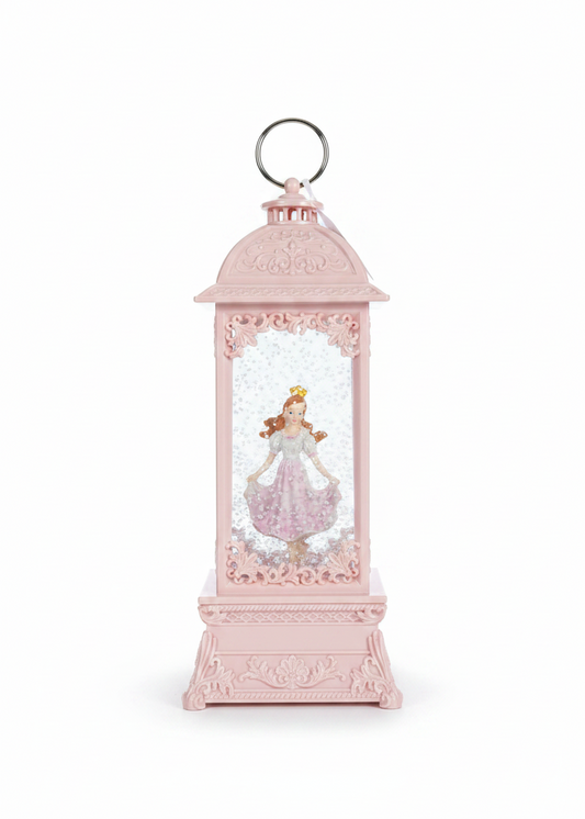 A pink decorative lantern-style ornament with a printed princess figure inside