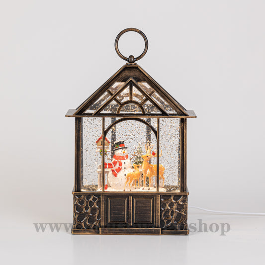 stable christmas snow globe santa front
