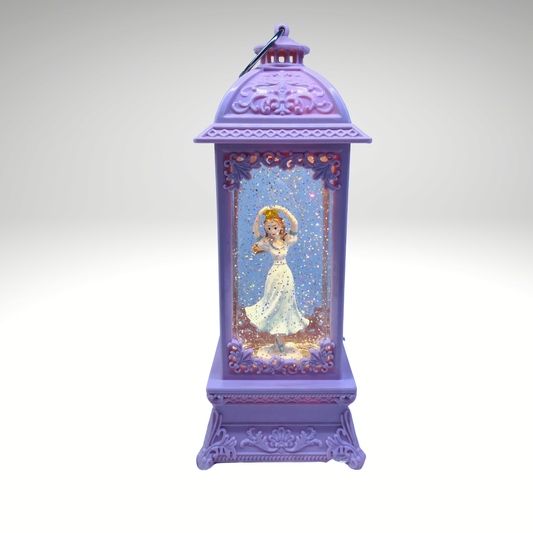 A purple decorative lantern-shaped ornament with a fairy figure inside, shown on a light gray gradient background.