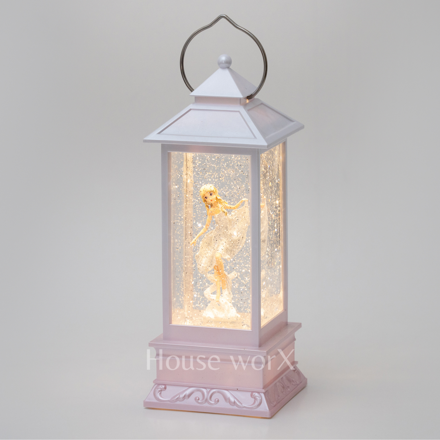 Decorative lantern with fairy figure inside on a light gray background snow globe