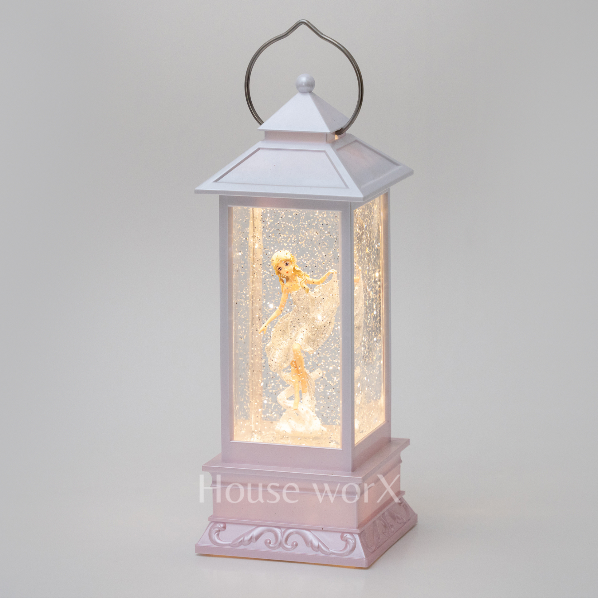Decorative lantern with fairy figure inside on a light gray background snow globe