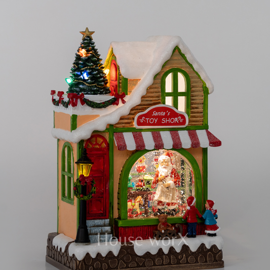 Decorative Christmas house with a tree and Santa Claus figure Snow Globe