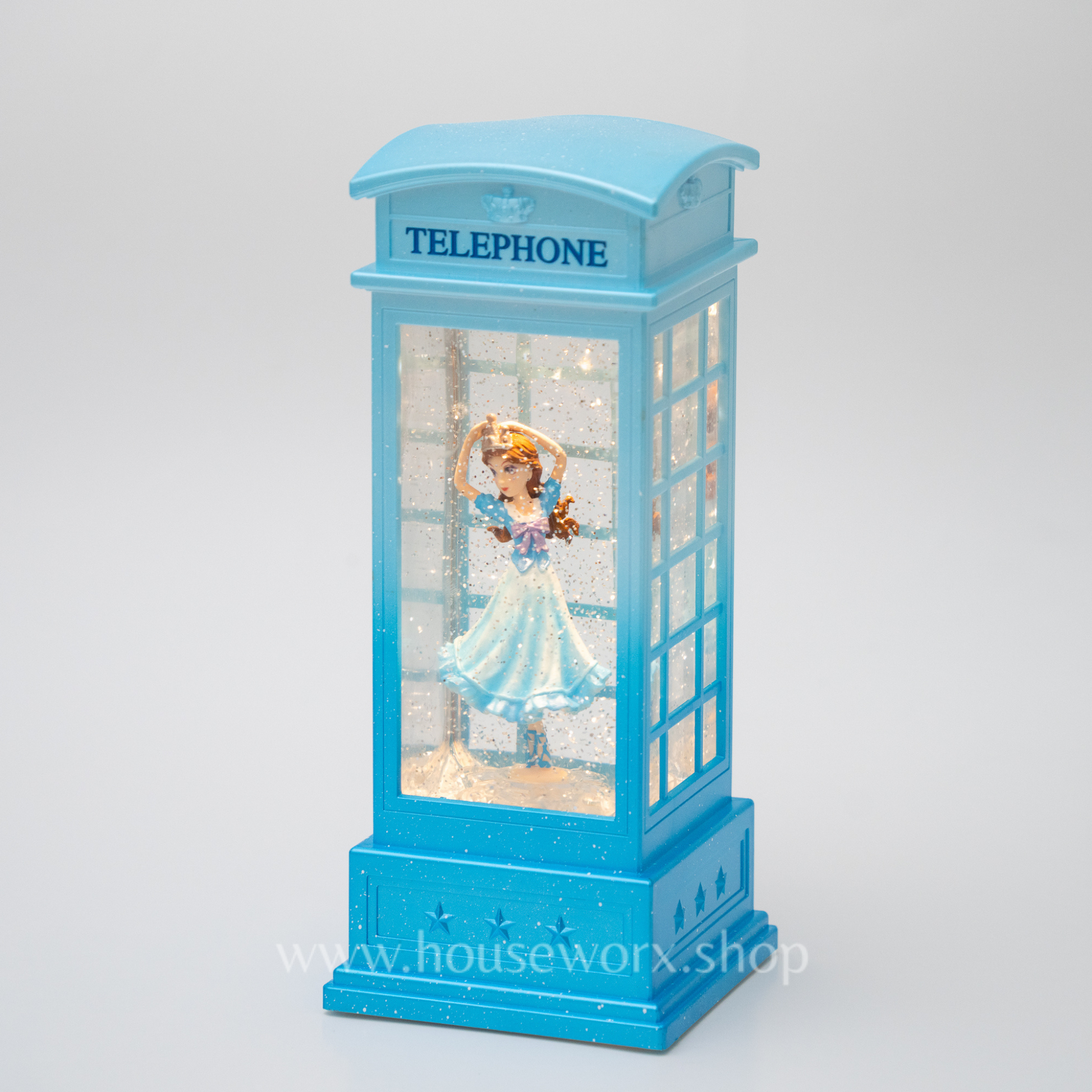 Blue telephone booth with a figurine inside on a white background