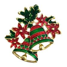 Christmas-themed brooch with a green bell and red flowers on a gold background