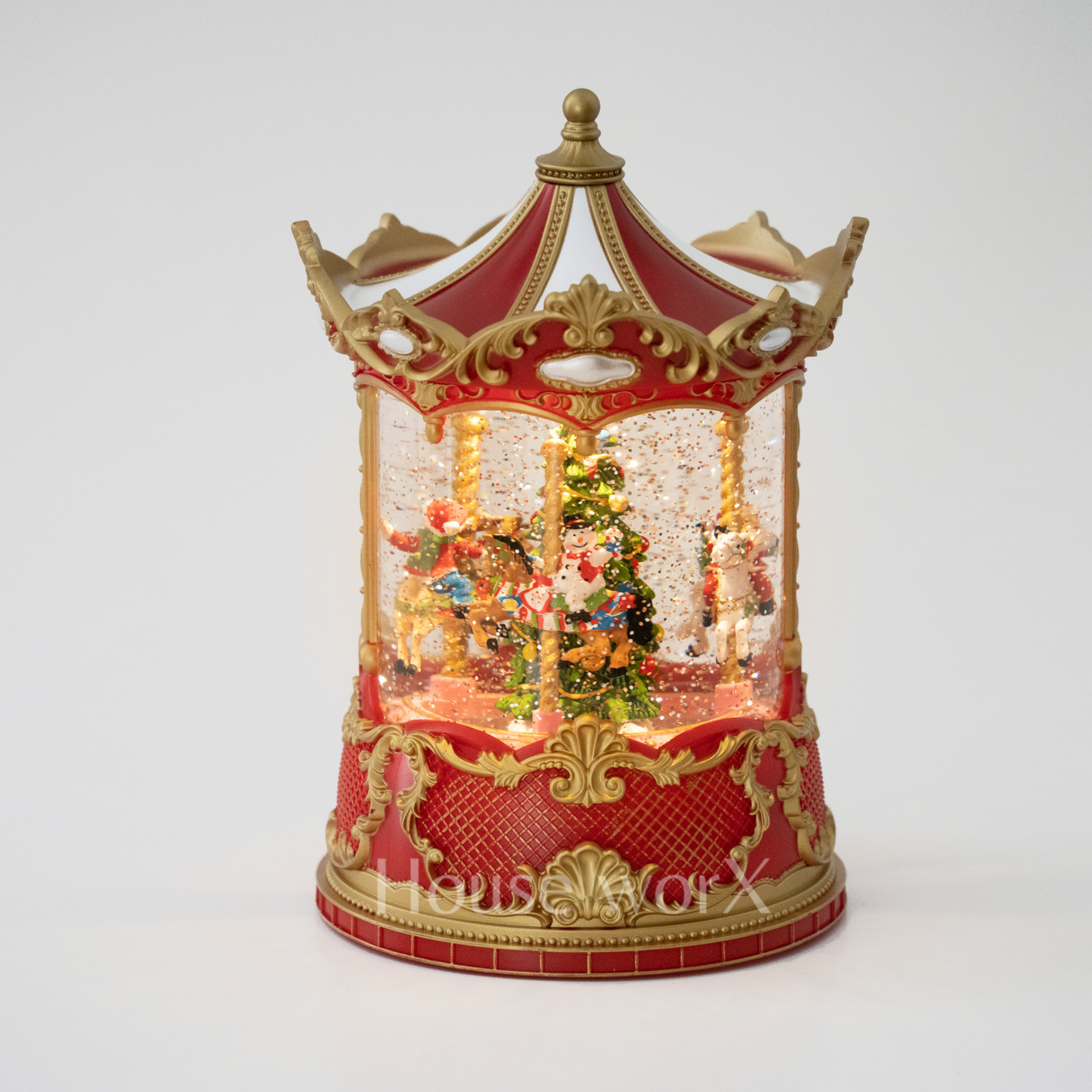 Decorative carousel Snow globe with lights on a white background