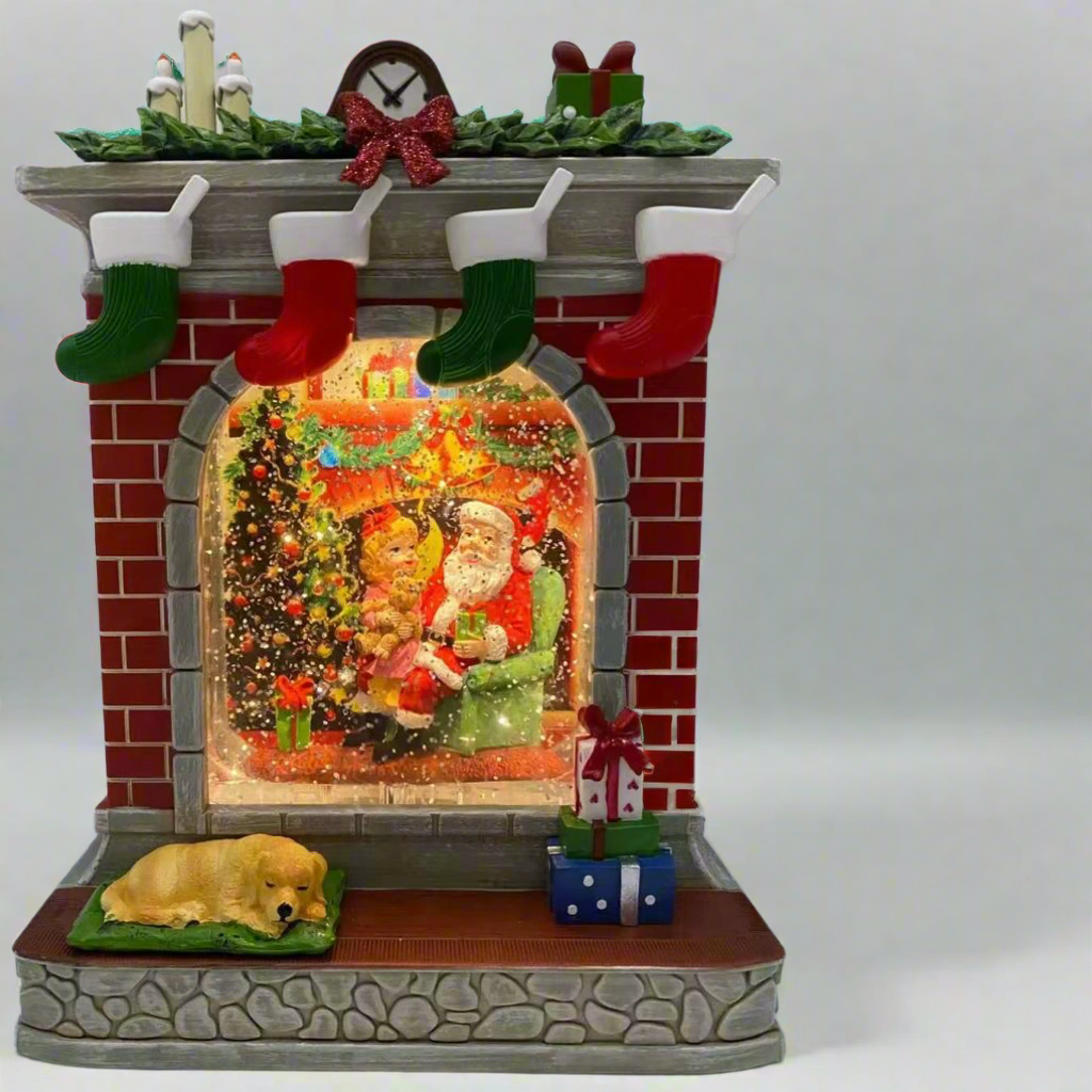 Decorative Christmas scene with Santa Claus, dog, and stockings on a fireplace. chrismas snow globe