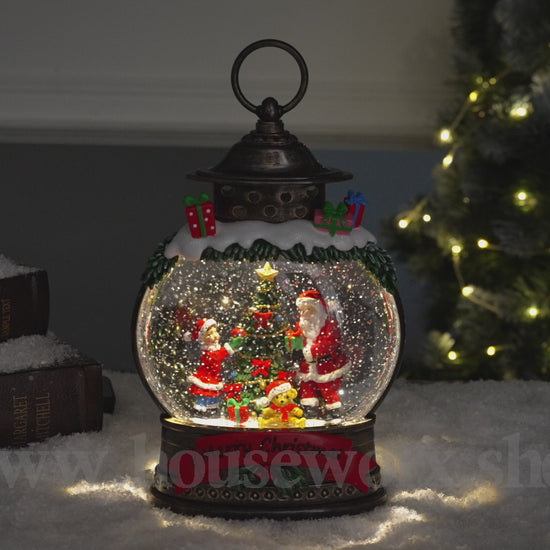 Festive oval collection snow globe santa video
