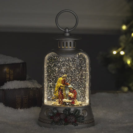 Ornate bell collection snow globe nativity video