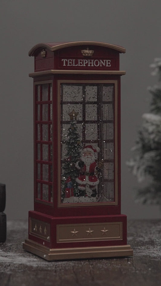 telephone booth christmas snow globe santa