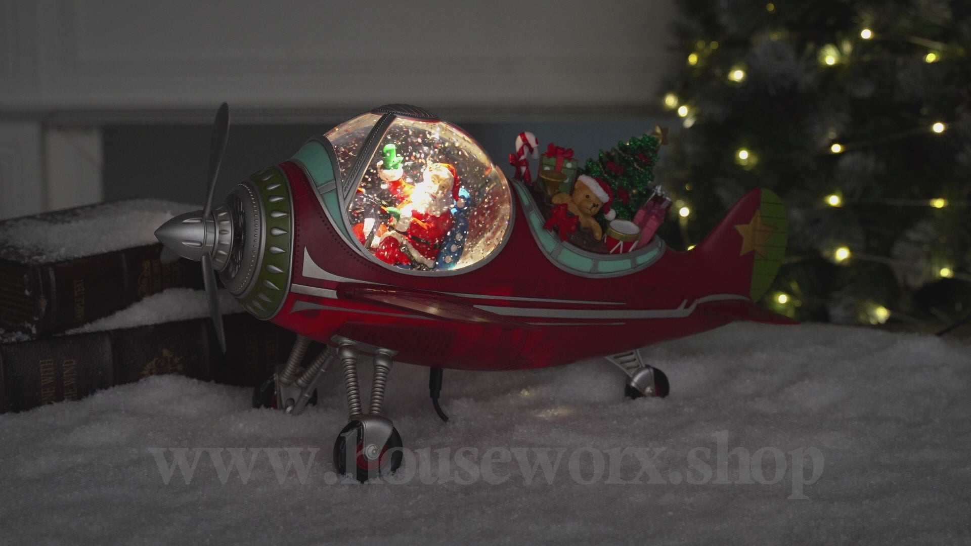 Festive plane snow globe santa video