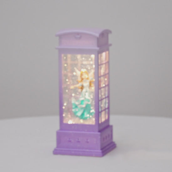 arla telephone booth purple blue dress