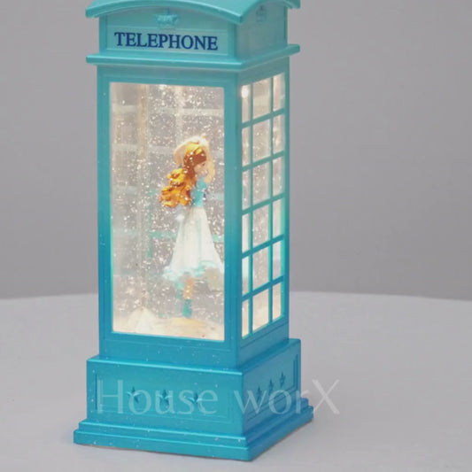 blue telephone booth snow globe video