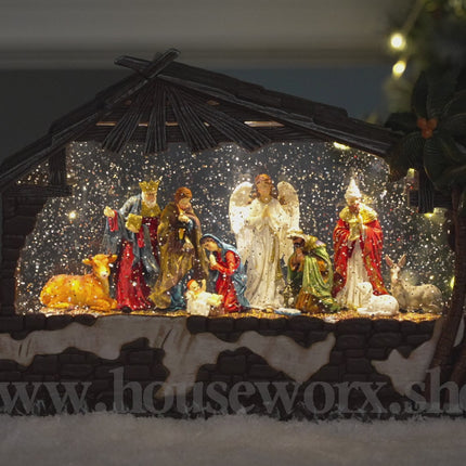 Creche large snow globe video