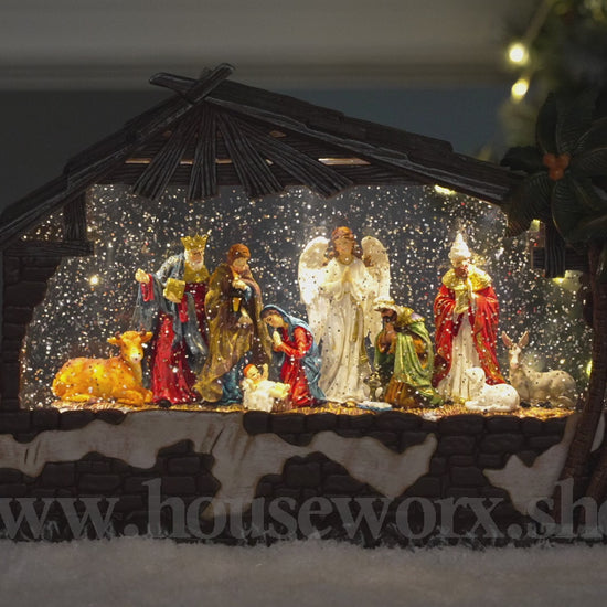Creche large snow globe video